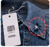 Hang tag still attached, with a small hole in the collar circled